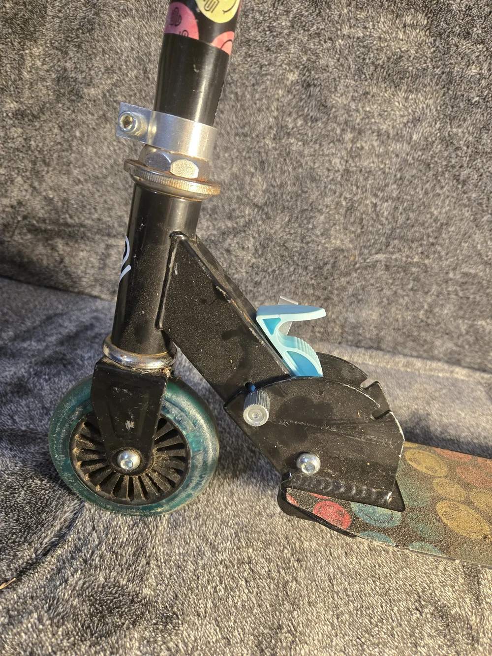 Justice Black and Teal Foldable Kids Scooter with Patterned Stem